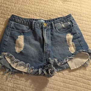 Show Me Your MuMu Distressed Blue Denim Cutoff Shorts